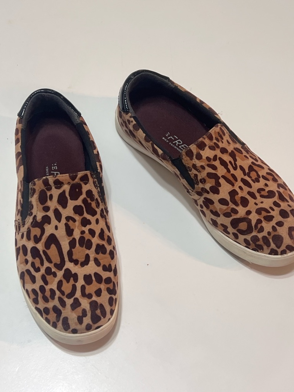 Dr. Scholl’s “Be Free” energy technology Leopard Slip-On Sneakers